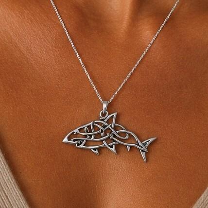 Detailed pewter Celtic shark pendant featuring an intricate openwork knotwork design forming the body and fins