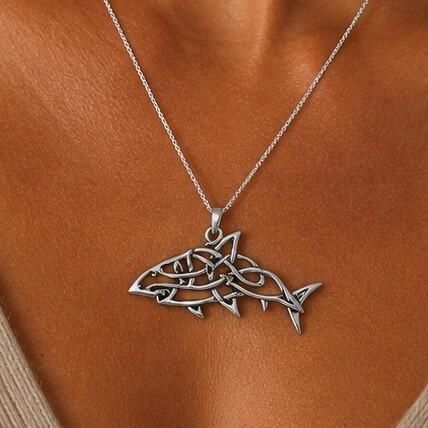 Detailed pewter Celtic shark pendant featuring an intricate openwork knotwork design forming the body and fins