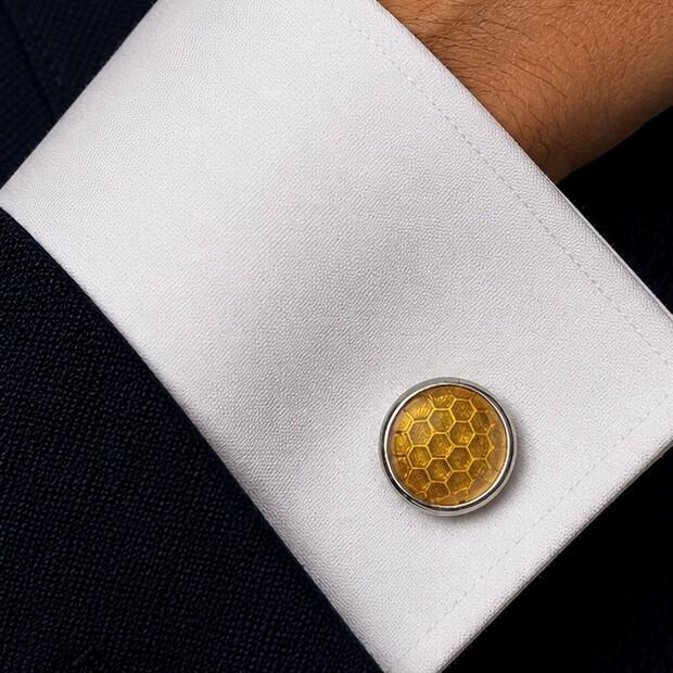 Handcrafted pewter cufflinks with a detailed honeycomb pattern embossed in transparent yellow enamel