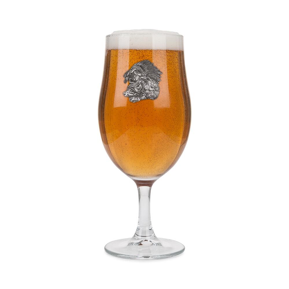 A Stemmed Pint Beer Glass with a Pewter Native American badge on the front, filled with BeerRetryClaude can make mistakes. Please double-check responses.