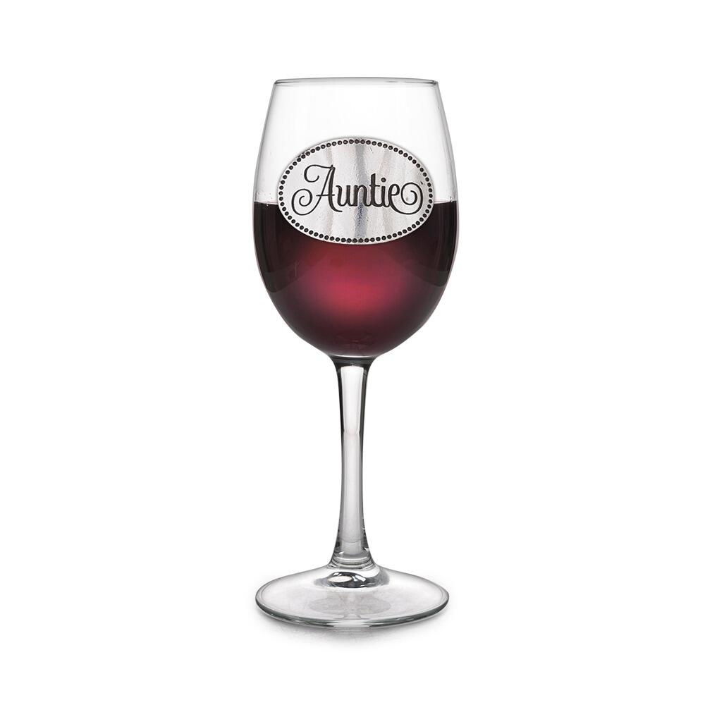 Wine glass with handcrafted pewter Auntie badge filled with red wine