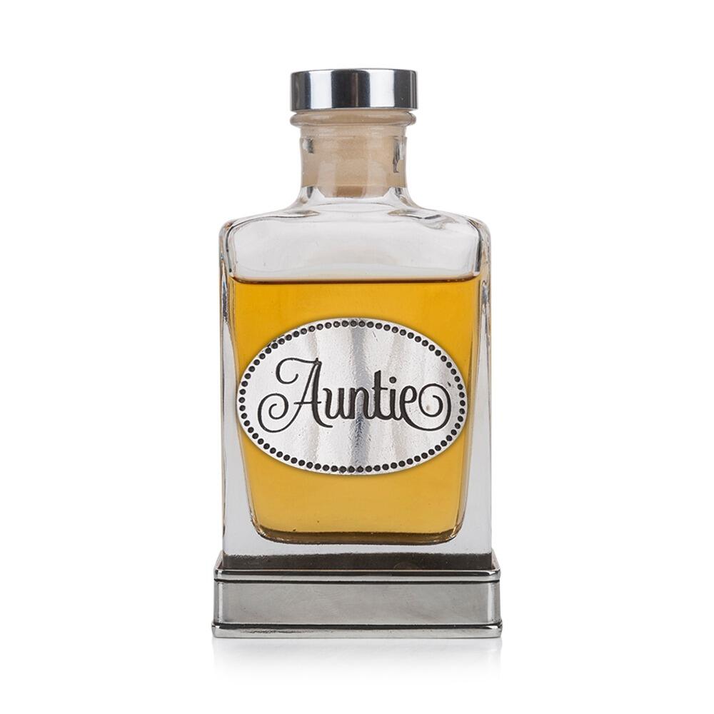 Handcrafted glass hip flask with pewter base featuring detailed auntie emblem on front