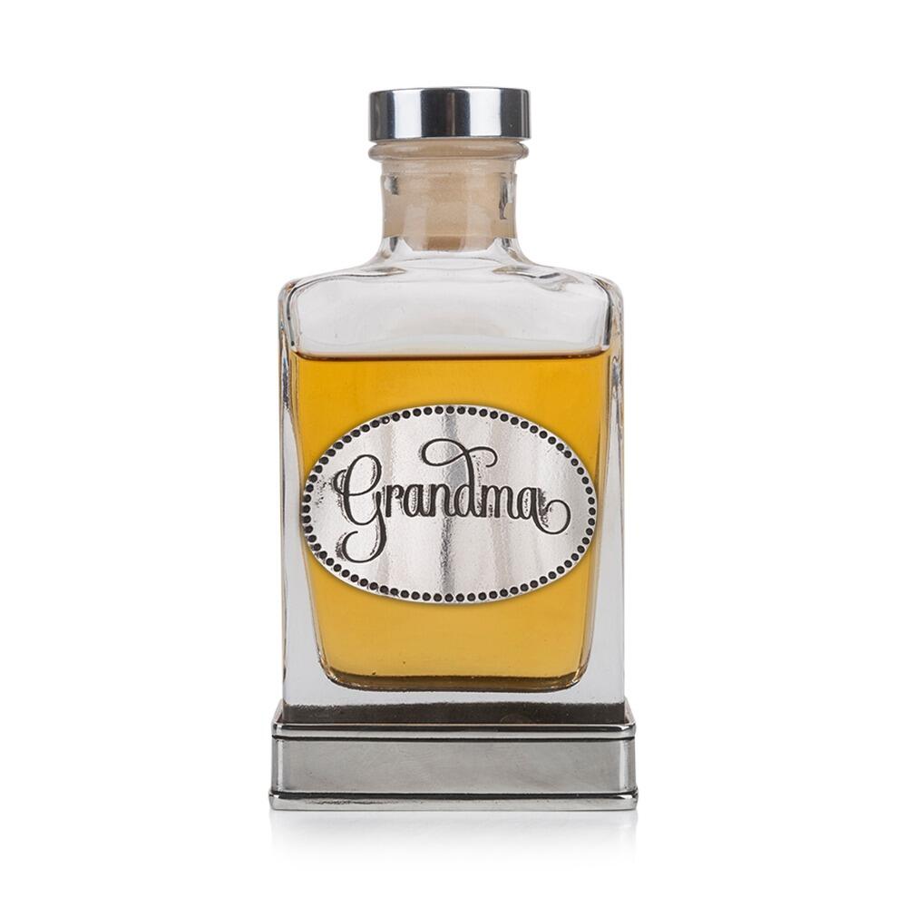 Handcrafted glass hip flask with pewter base featuring detailed grandma emblem on front
