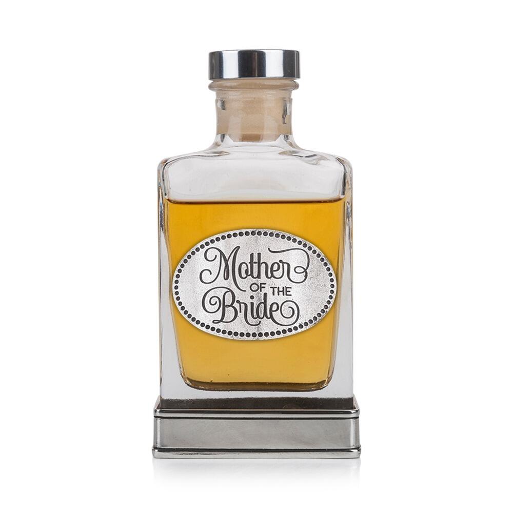 A glass flask with a pewter base and a handcrafted pewter “Mother of the Bride” emblem on the front