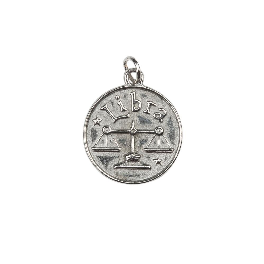 A Pewter charm with the words Libra on the front