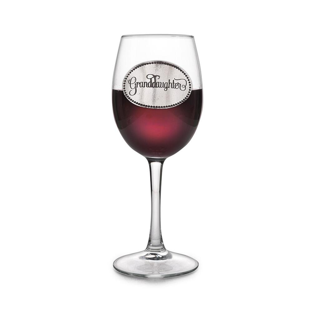 Wine glass with handcrafted pewter Granddaughter badge filled with red wine