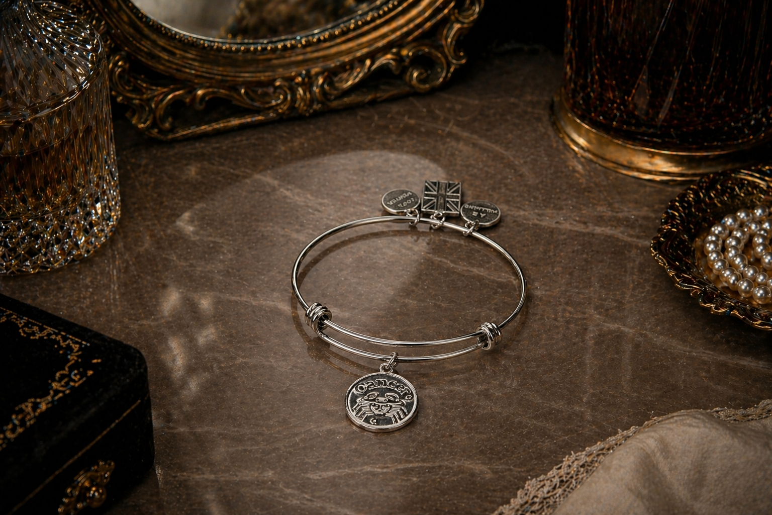 Pewter Cancer Charm Bracelet on a vanity desk