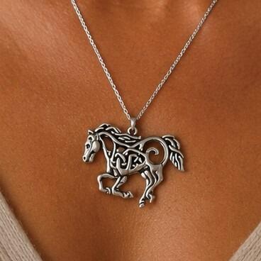 Detailed pewter Celtic horse pendant featuring intricate knotwork throughout the body