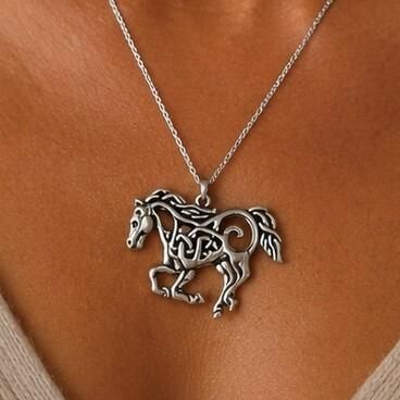 Detailed pewter Celtic horse pendant featuring intricate knotwork throughout the body