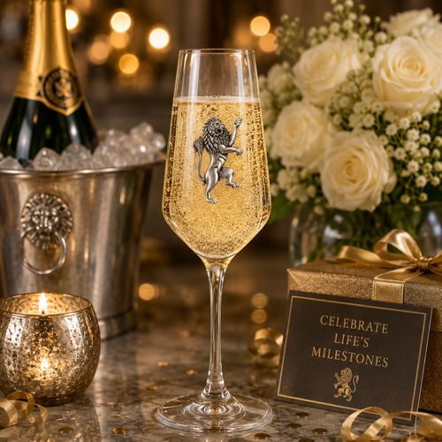 A Champagne Flute with a Pewter Rampant Lion badge on the front, filled with Champagne