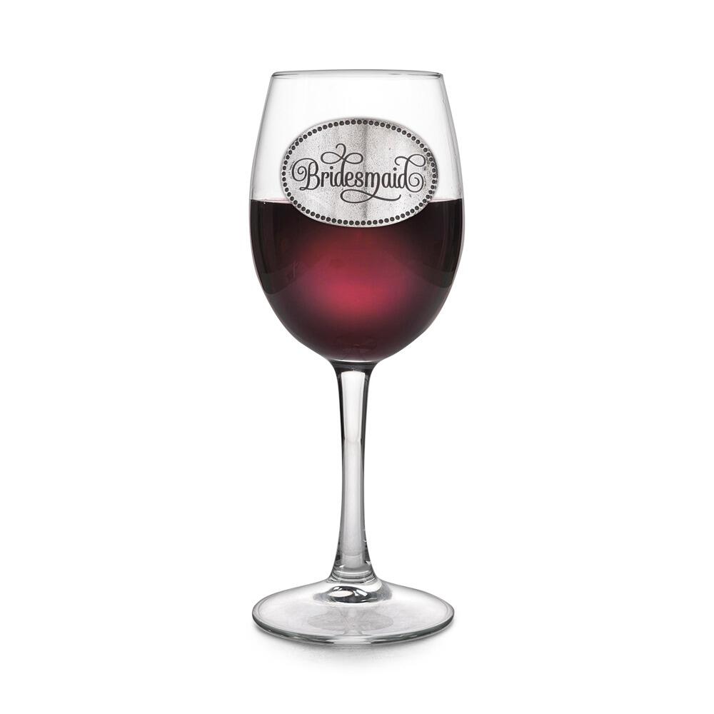 Wine glass with handcrafted pewter Bridesmaid badge filled with red wine