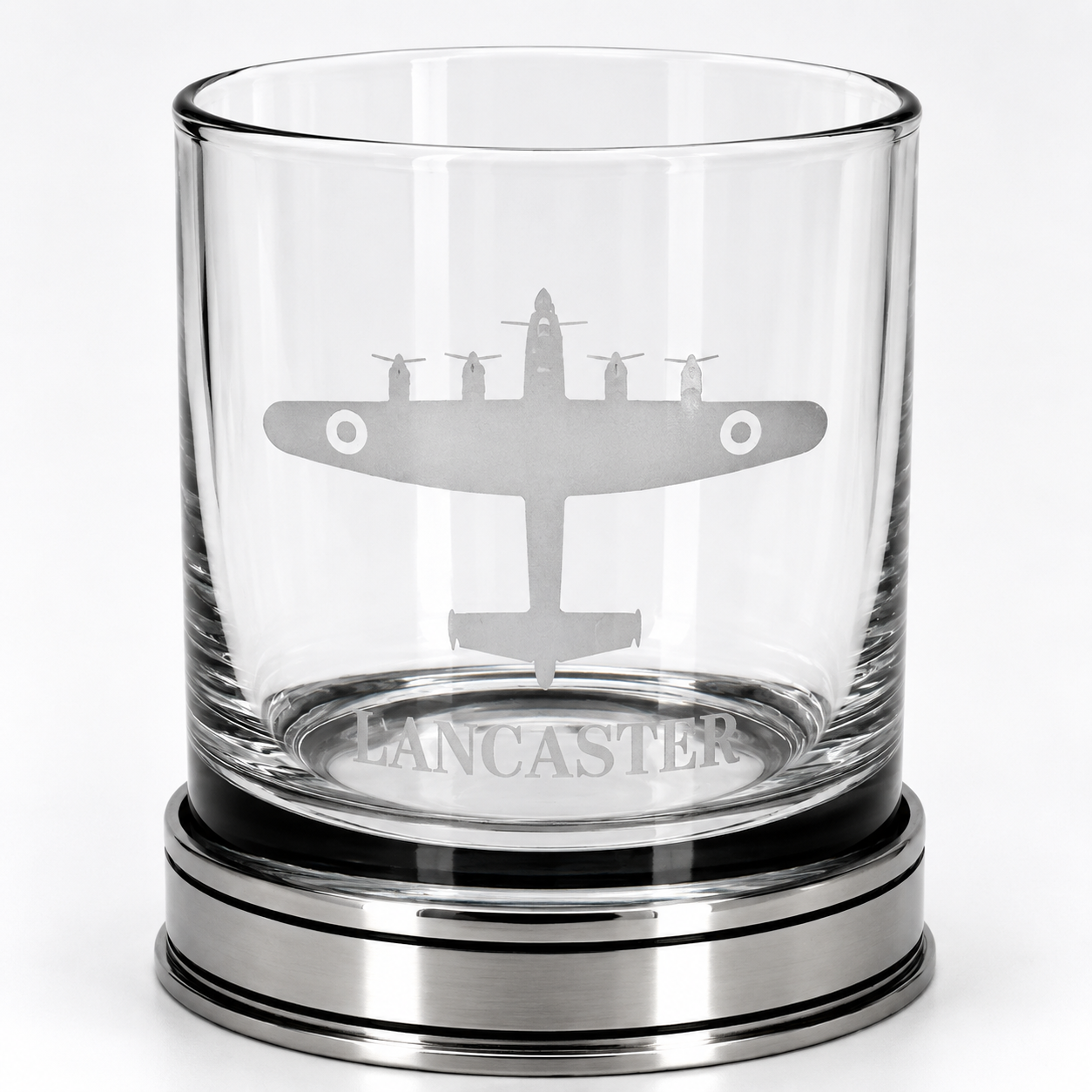 A whisky glass engraved with a lancaster bomber design