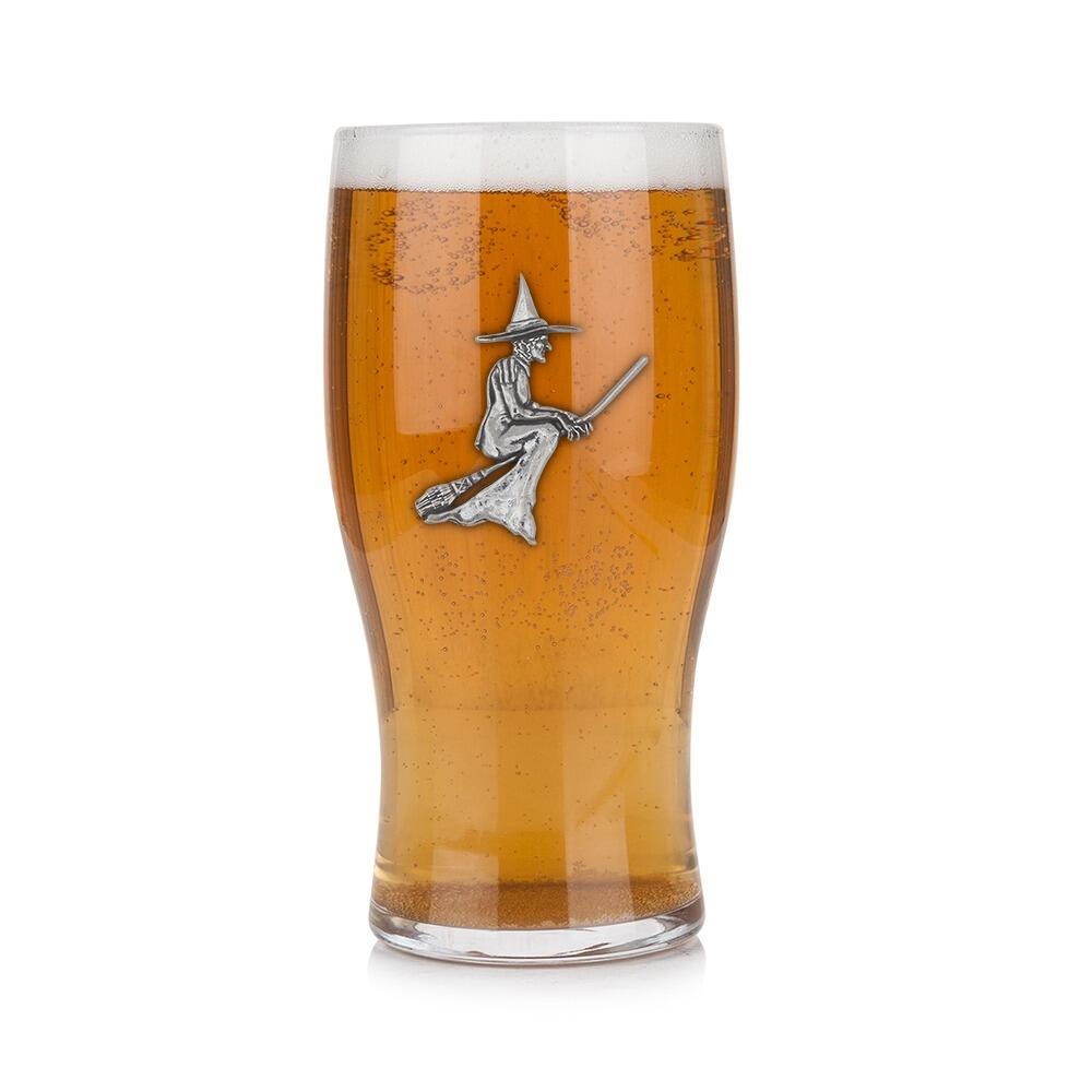 Pint glass with handmade pewter "Witch" badge, filled with golden beer