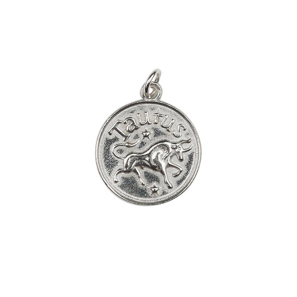 A pewter Taurus Charm