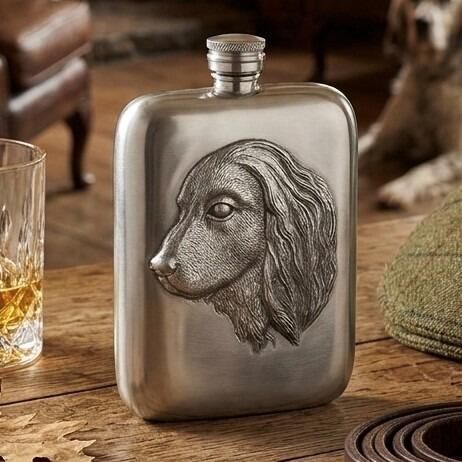 Pewter hip flask with an engraved profile of a Spaniel dog