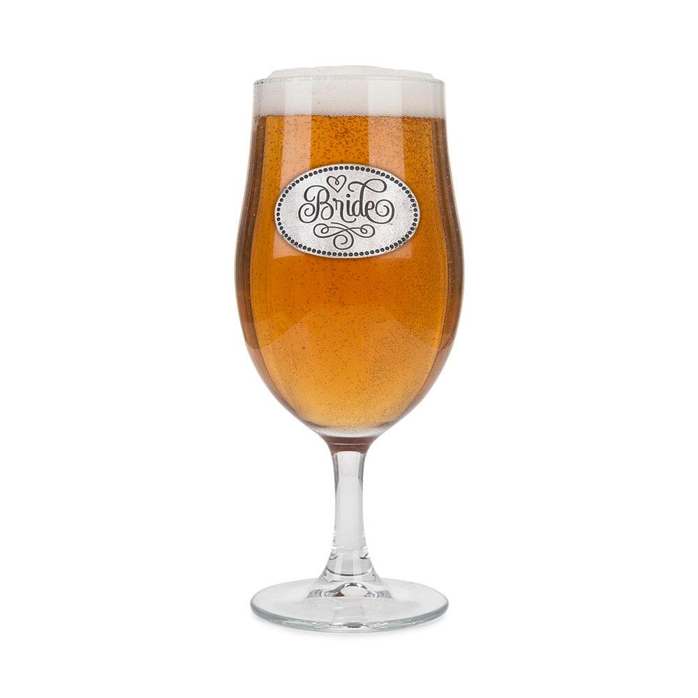 A Stemmed Pint Beer Glass with a Pewter Bride badge on the front, filled with Beer