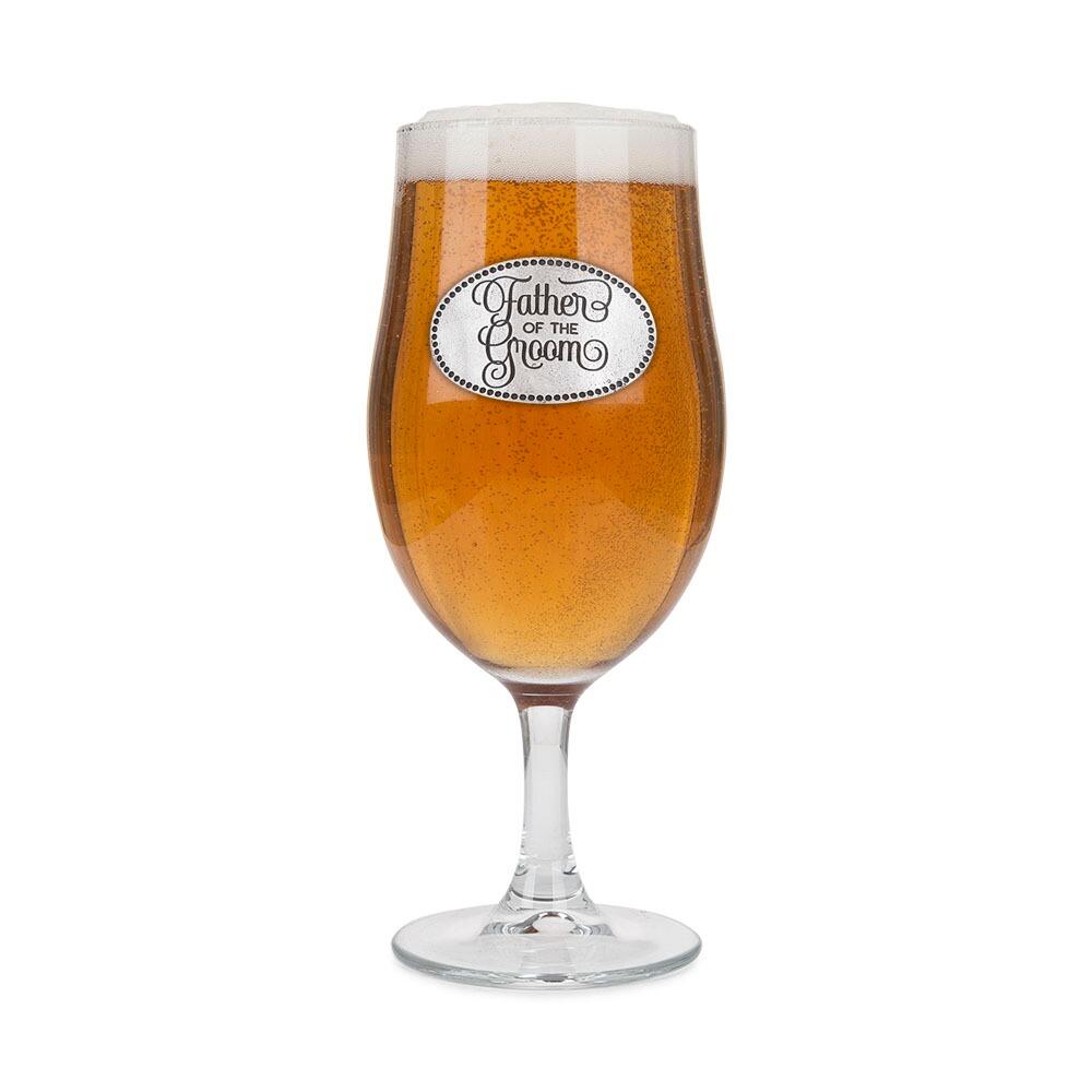 A Stemmed Pint Beer Glass with a Pewter Father of the Groom badge on the front, filled with Beer