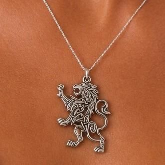 Detailed pewter Celtic lion rampant pendant featuring intricate knotwork patterns across the body