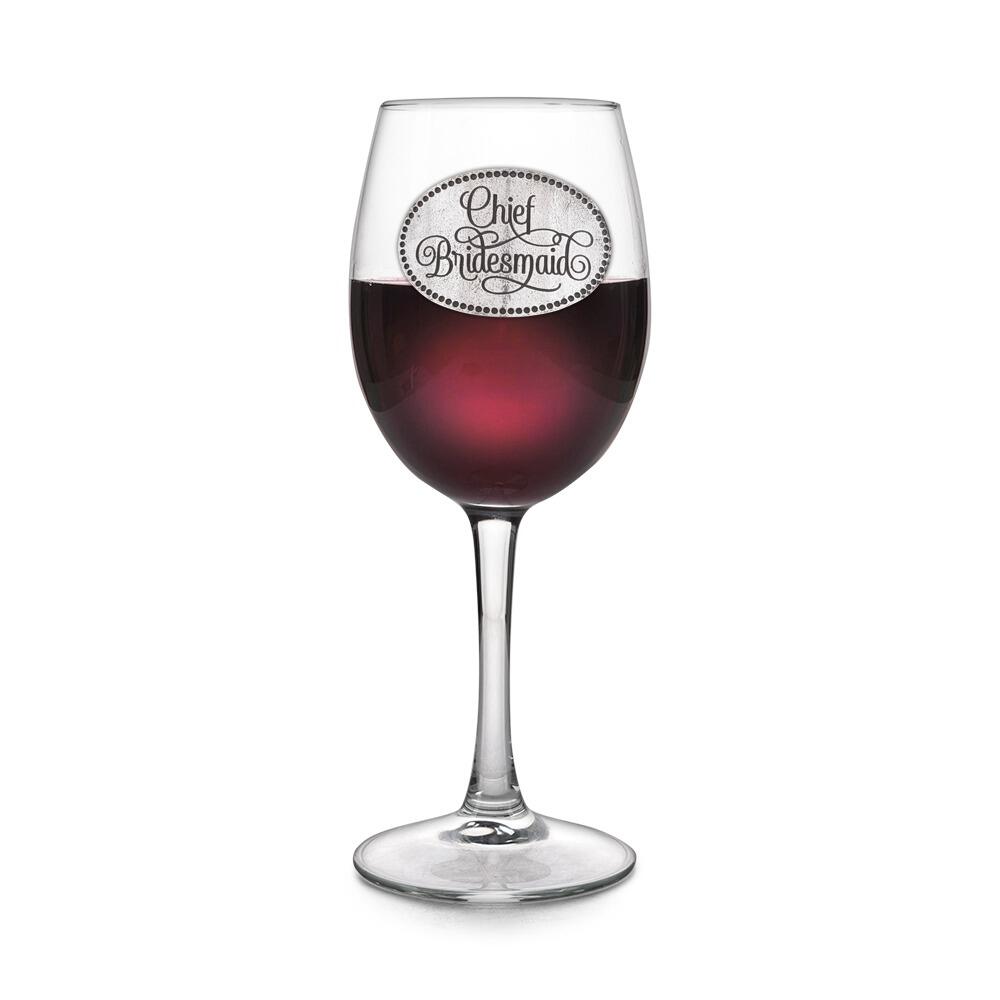Wine glass with handcrafted pewter Chief Bridesmaid badge filled with red wine