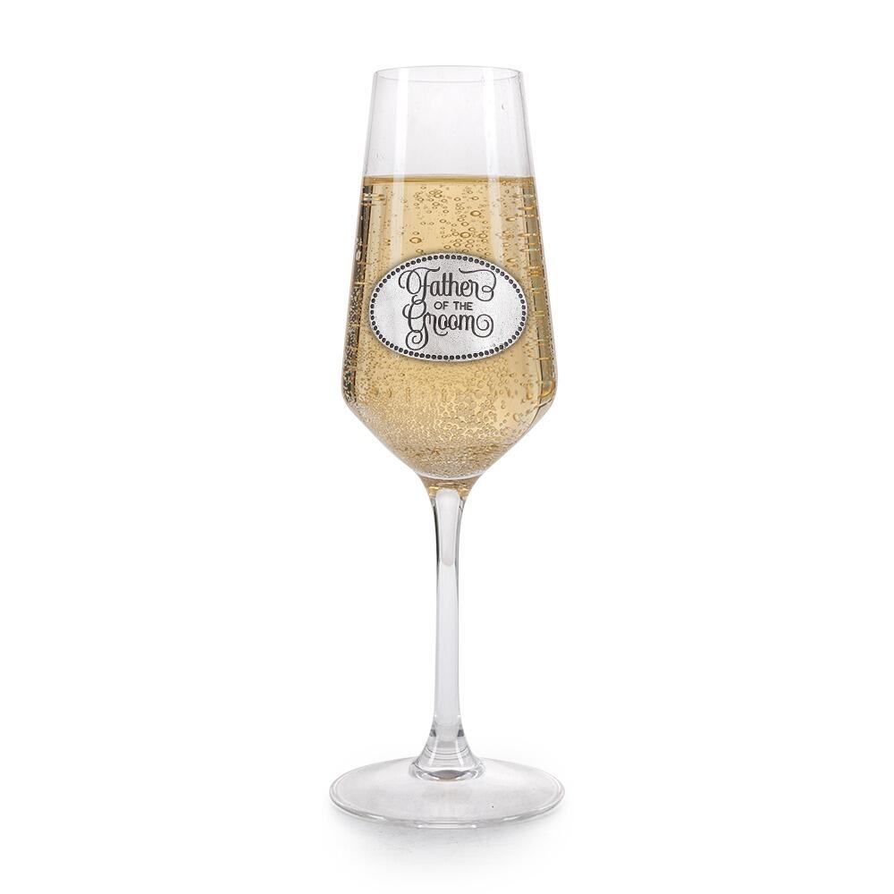 A Champagne Flute with a Pewter Father of the Groom badge on the front, filled with Champagne