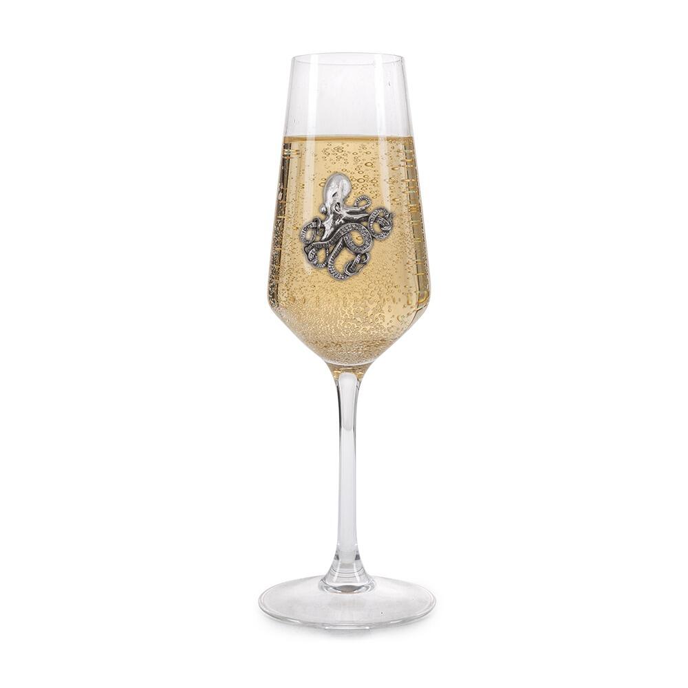 A Champagne Flute with a Pewter Octopus badge on the front, filled with Champagne