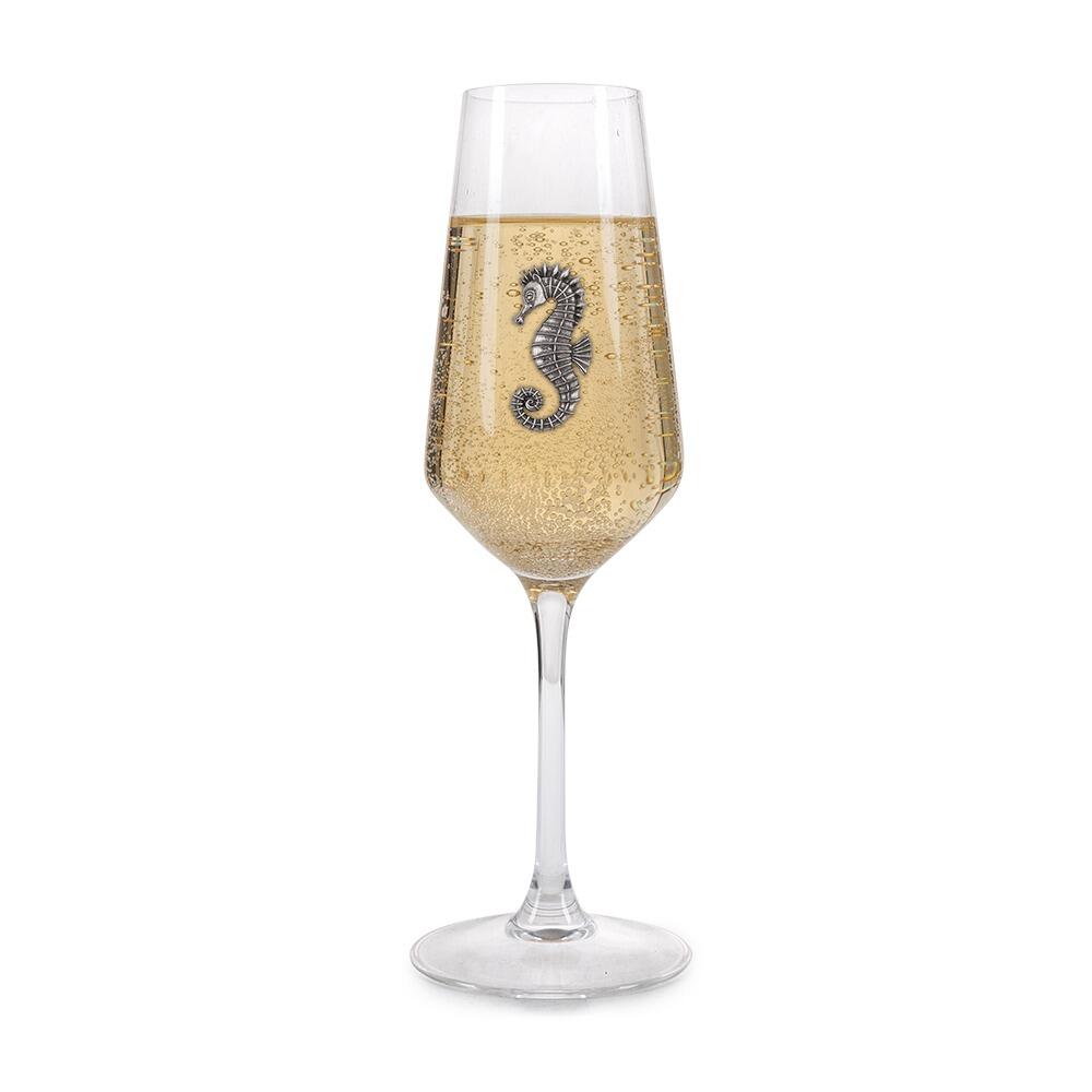 A Champagne Flute with a Pewter Seahorse badge on the front, filled with Champagne