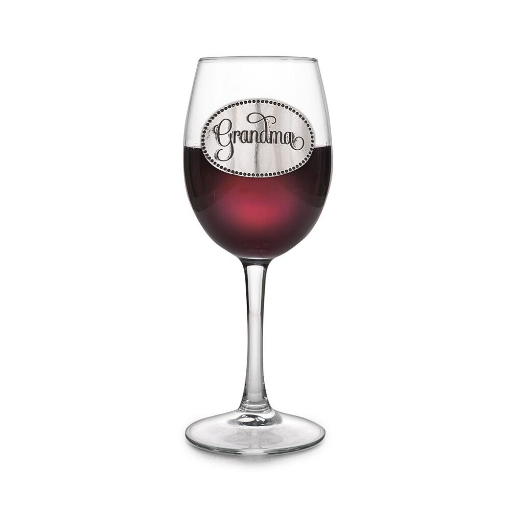 Wine glass with handcrafted pewter Grandma badge filled with red wine