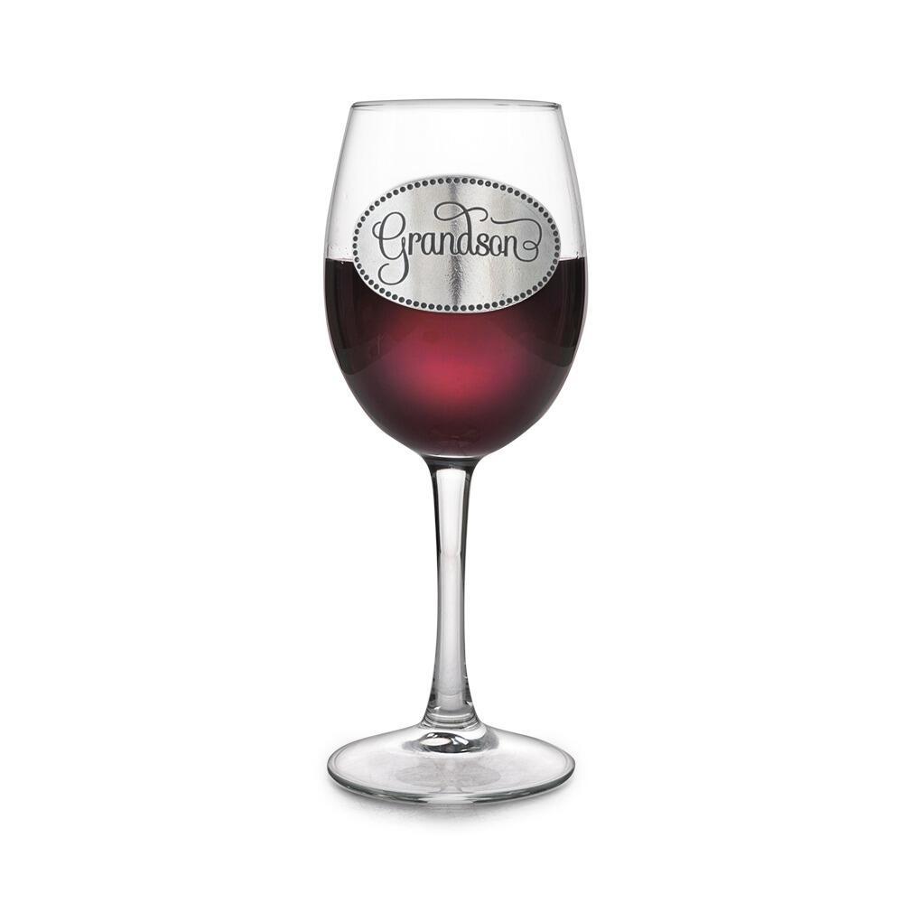 Wine glass with handcrafted pewter Grandson badge filled with red wine