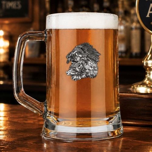A Beer Tankard with a Pewter Native badge on the front, filled with Amber Beer