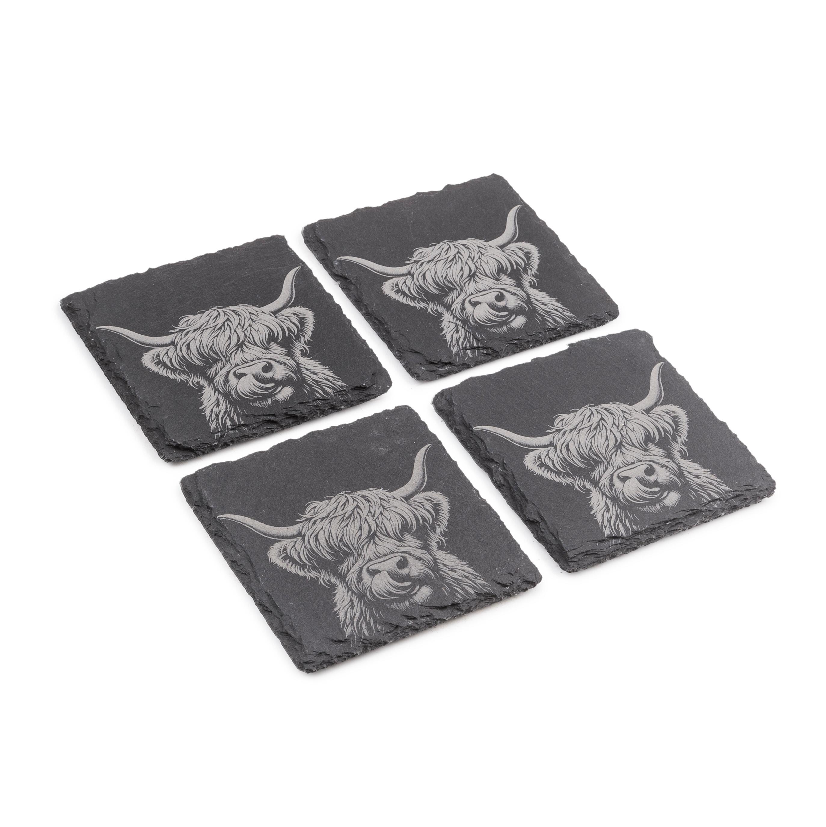Set of four natural slate coasters with etched Highland Cow design