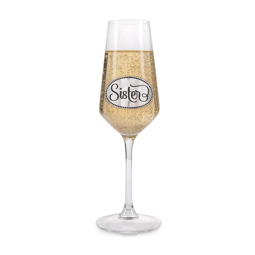 A Champagne Flute with a Pewter Sister badge on the front, filled with Champagne