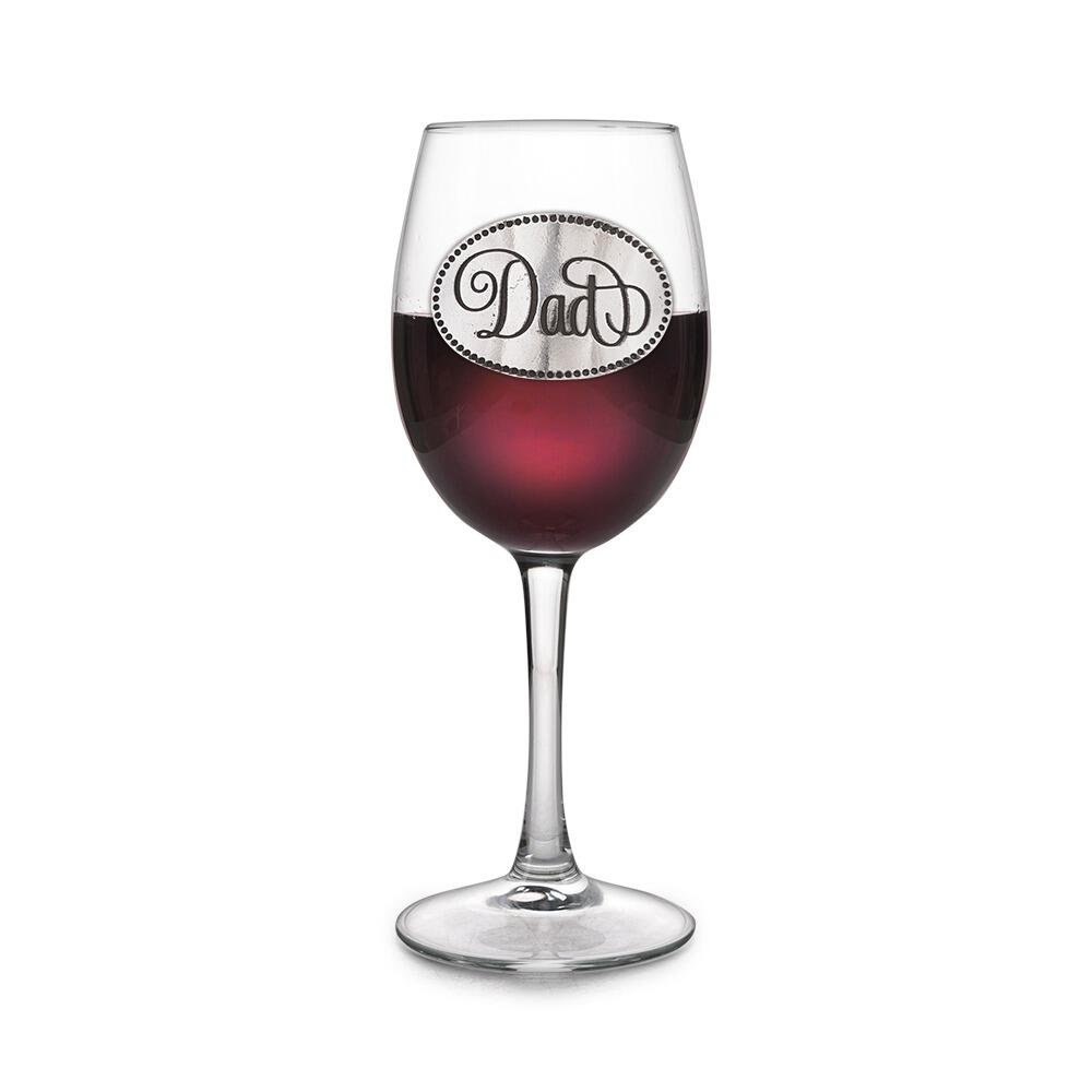 Wine glass with handcrafted pewter Dad badge filled with red wine