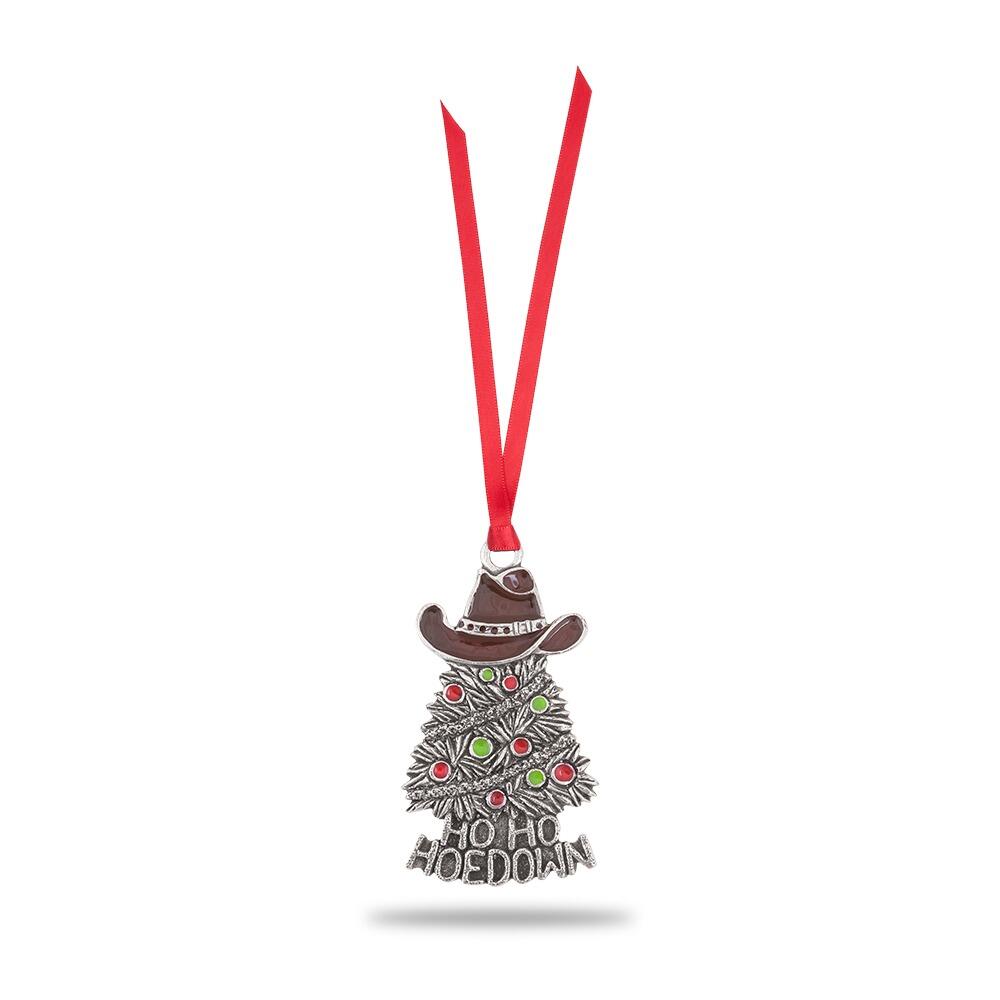 Hand-enamelled pewter Christmas tree bauble with cowboy hat and "Ho Ho Hoedown" text hanging on tree