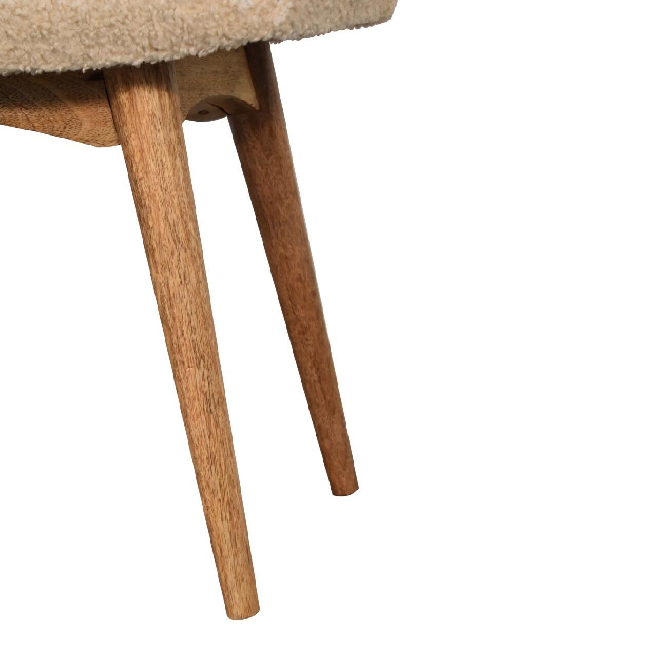 curved cream boucle bench