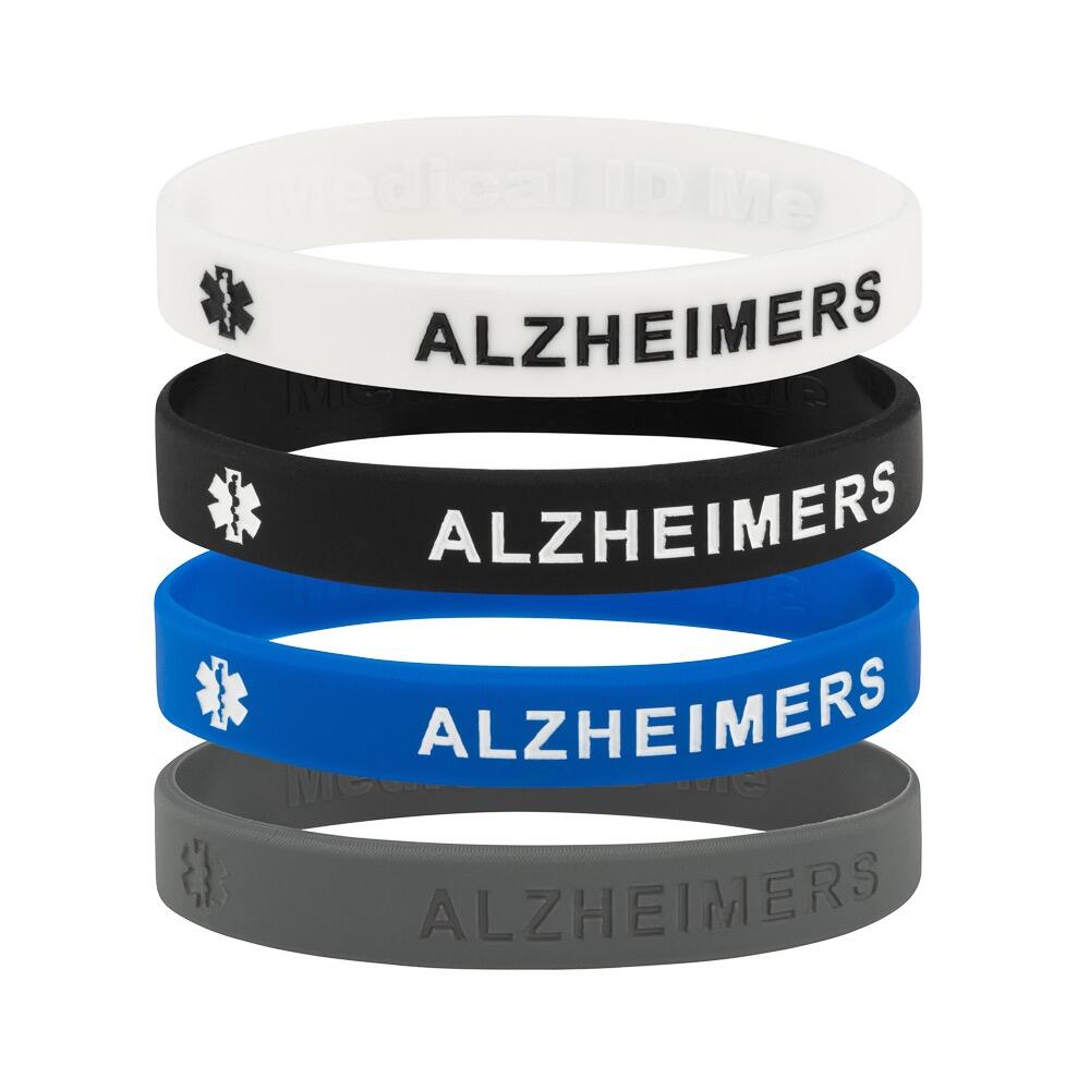 Stack of Alzheimer’s awareness silicone bracelets in black, blue, grey and white