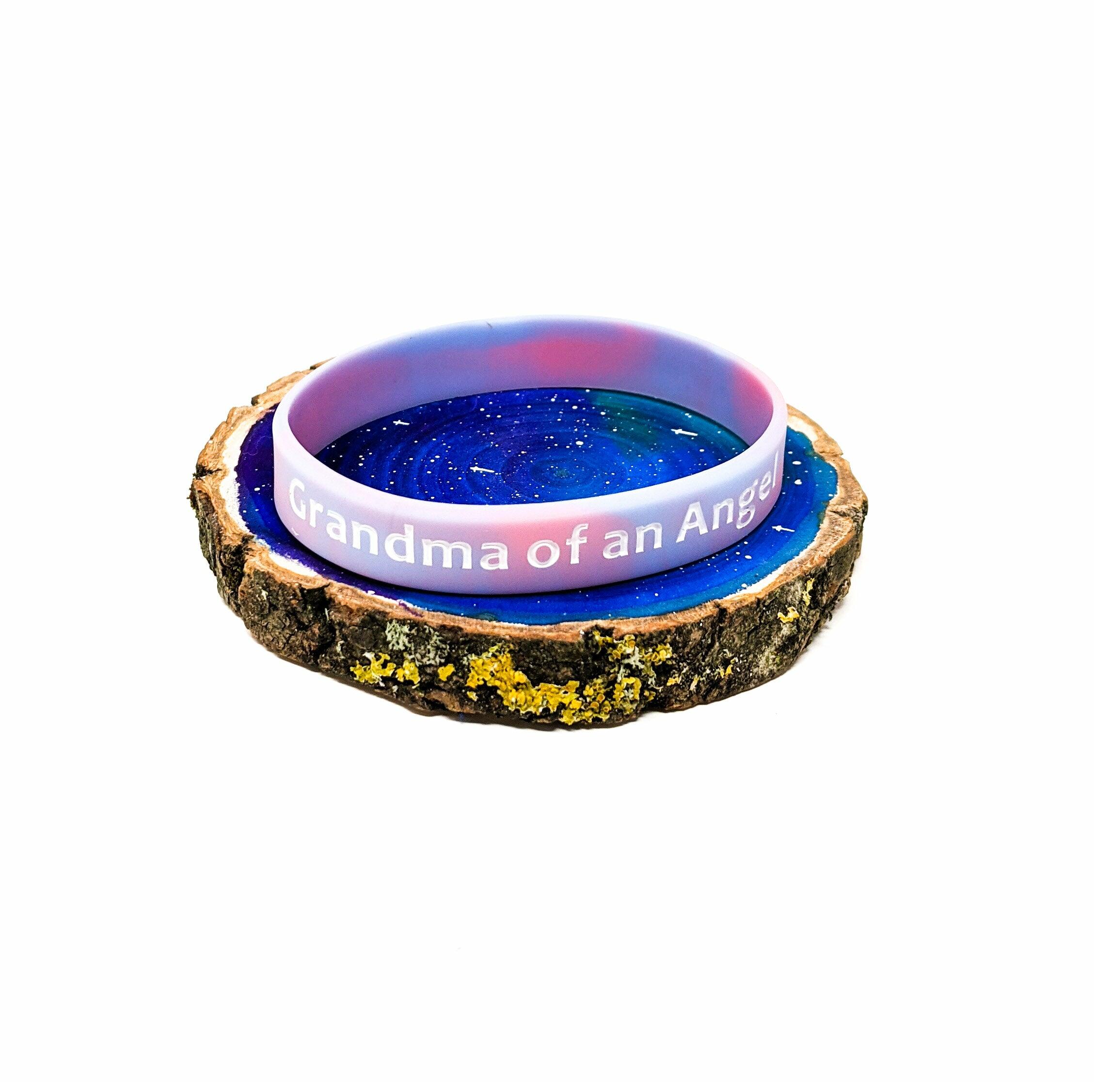 Baby loss awareness bracelet with “Grandma of an Angel” text on marbled silicone wristband