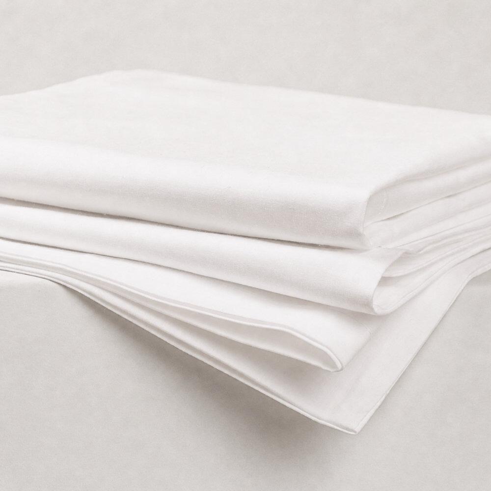 Folded white body pillowcases showing soft fabric folds