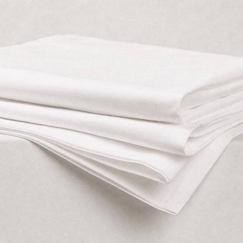 Folded white body pillowcases showing soft fabric folds