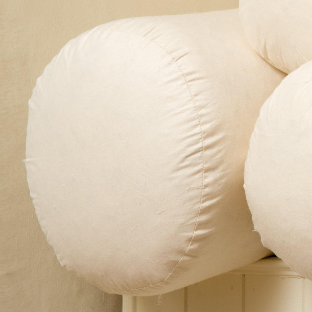 Close-up of a cream bolster cushion insert