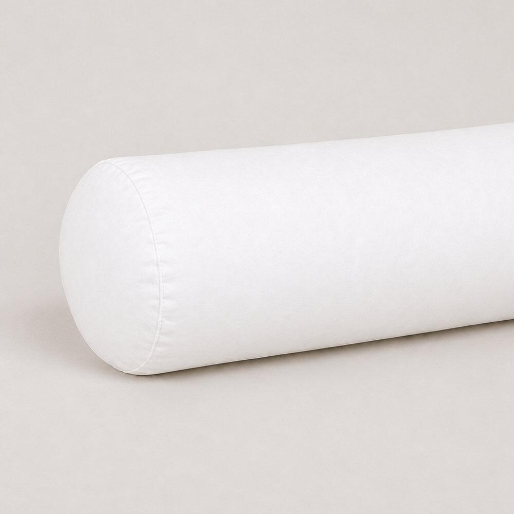 Close-up of top-stitching on a white cot bolster pillow