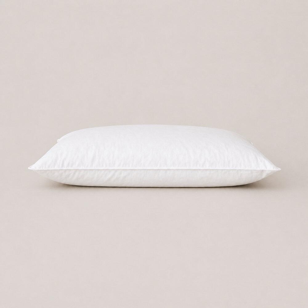 White adjustable wool pillow with top-stitched edges