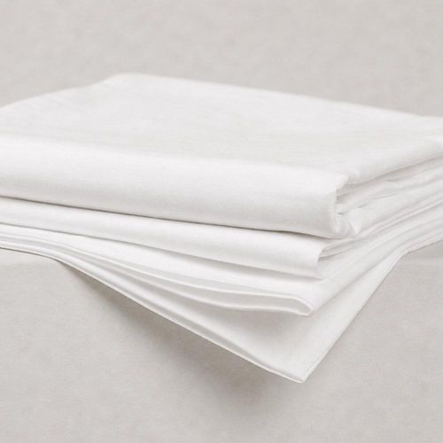 Folded white super king pillowcases showing soft fabric folds
