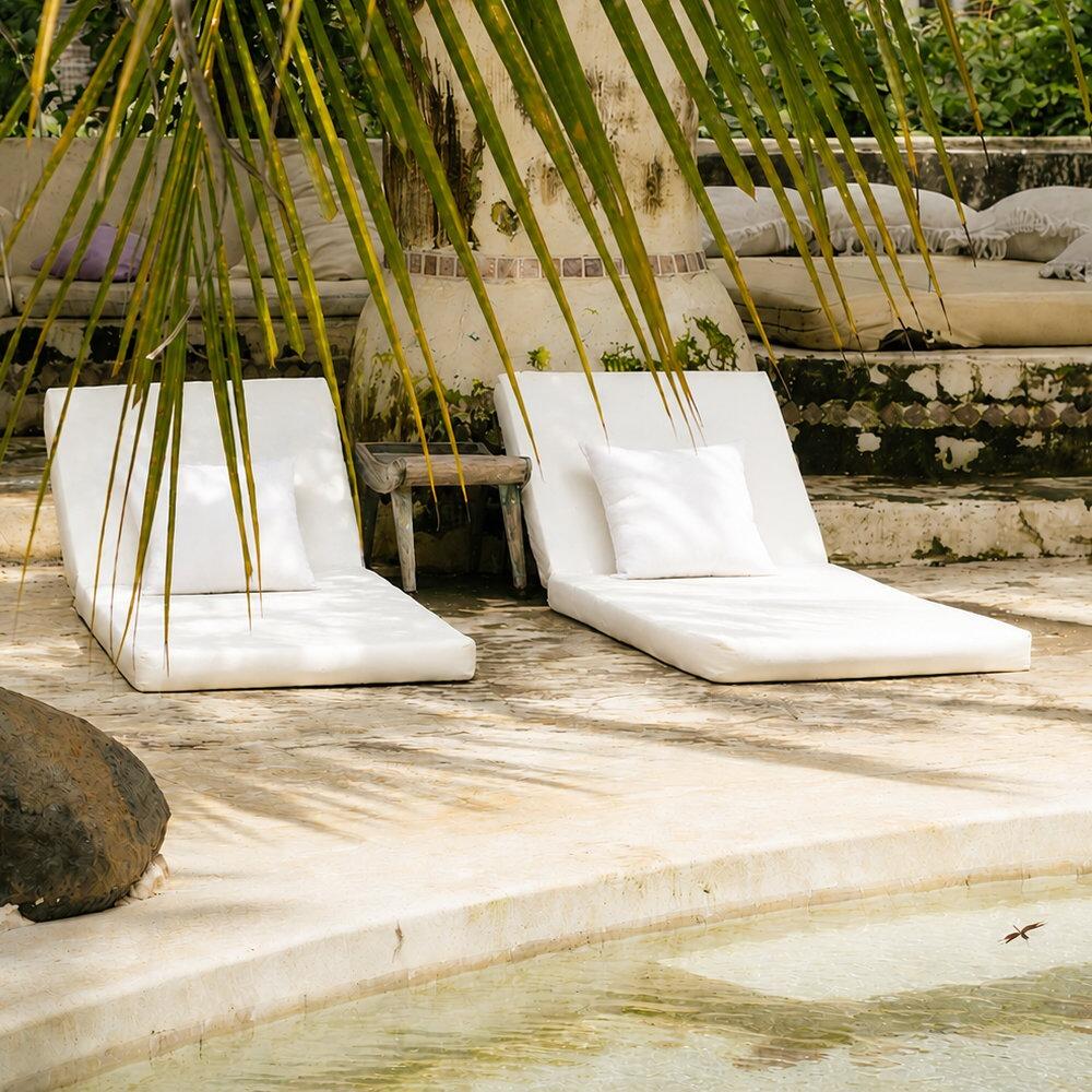 Outdoor cushion inserts shown on outdoor loungers