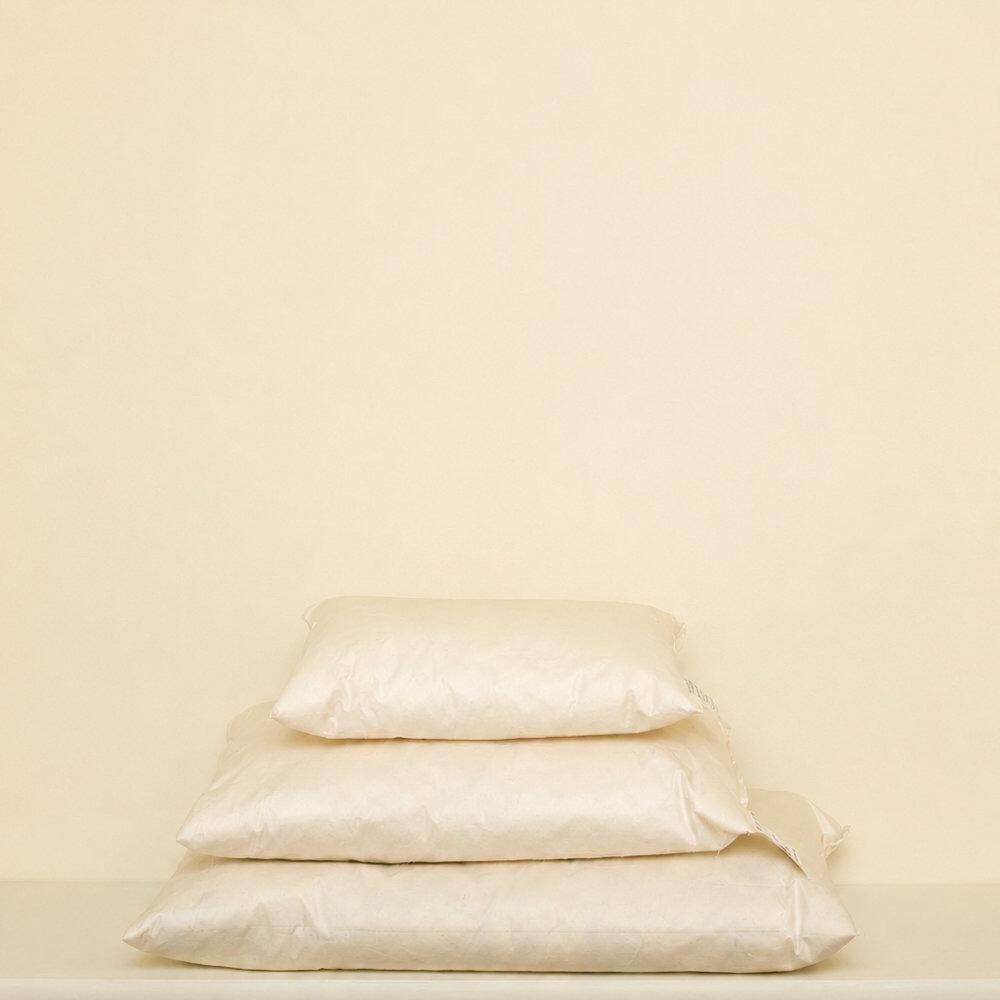 Cream rectangle cushion inserts stacked together