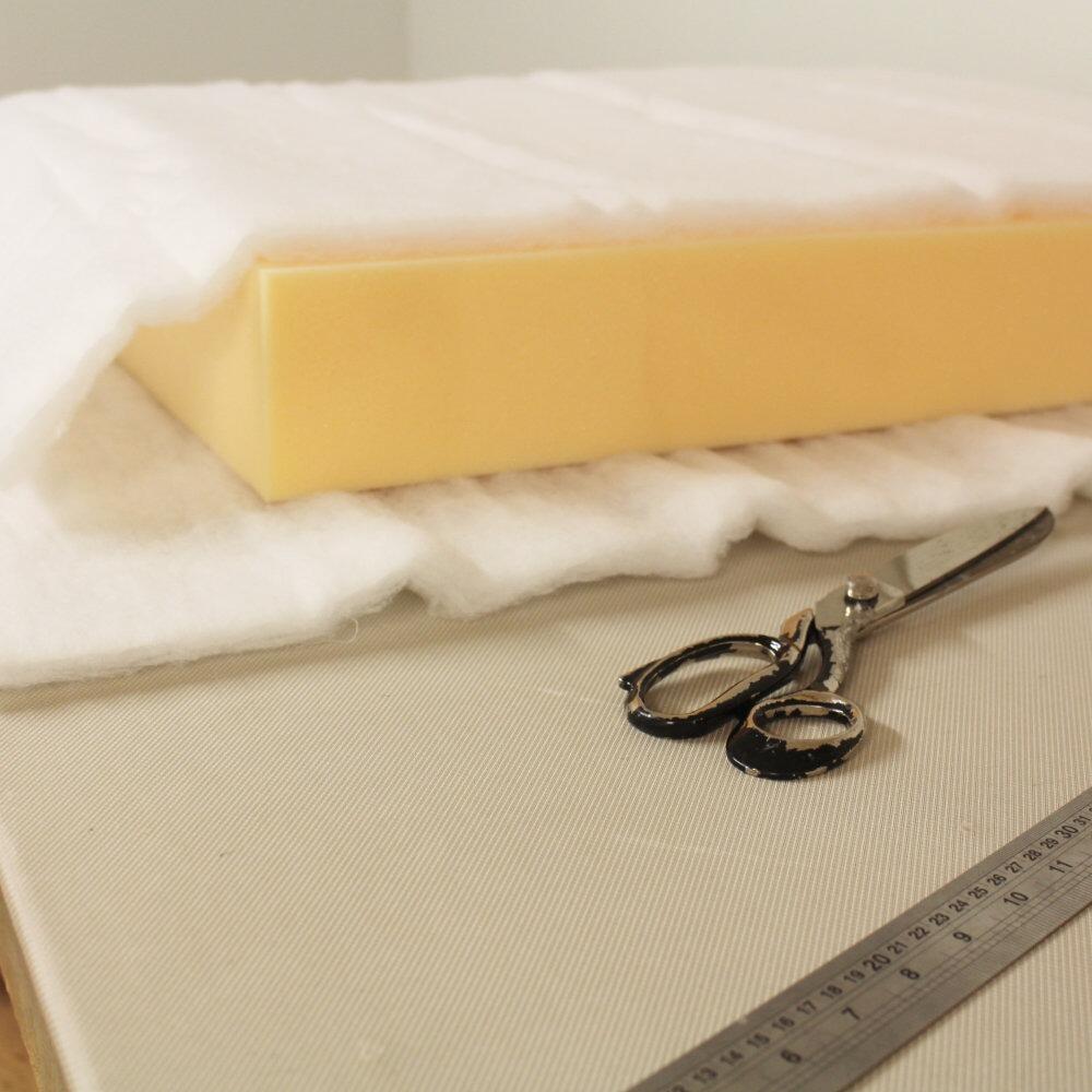 Polyester dacron wadding placed ready to stick onto foam
