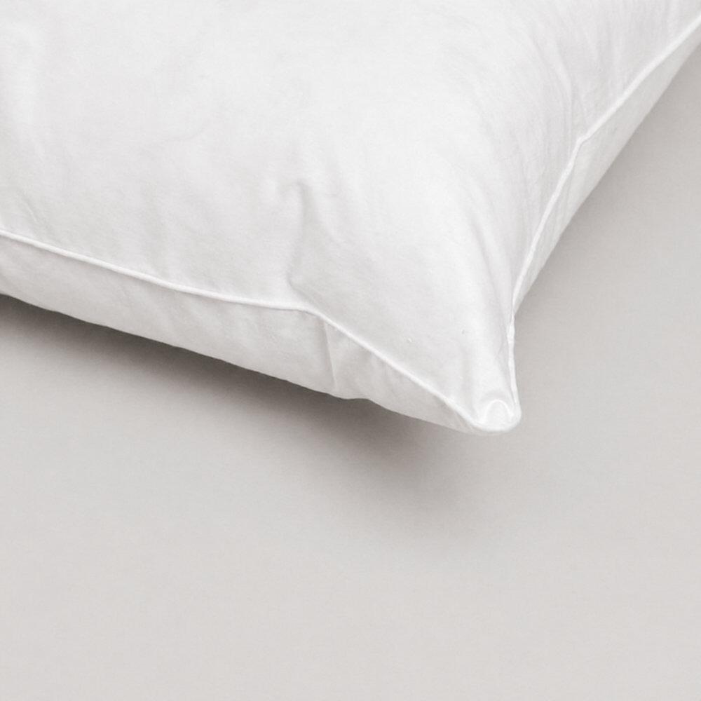 Close-up of a pillow corner with stitched edging