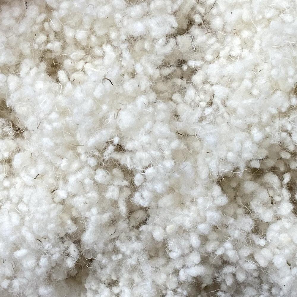 Close-up of natural sheep's wool filling for adjustable pillows