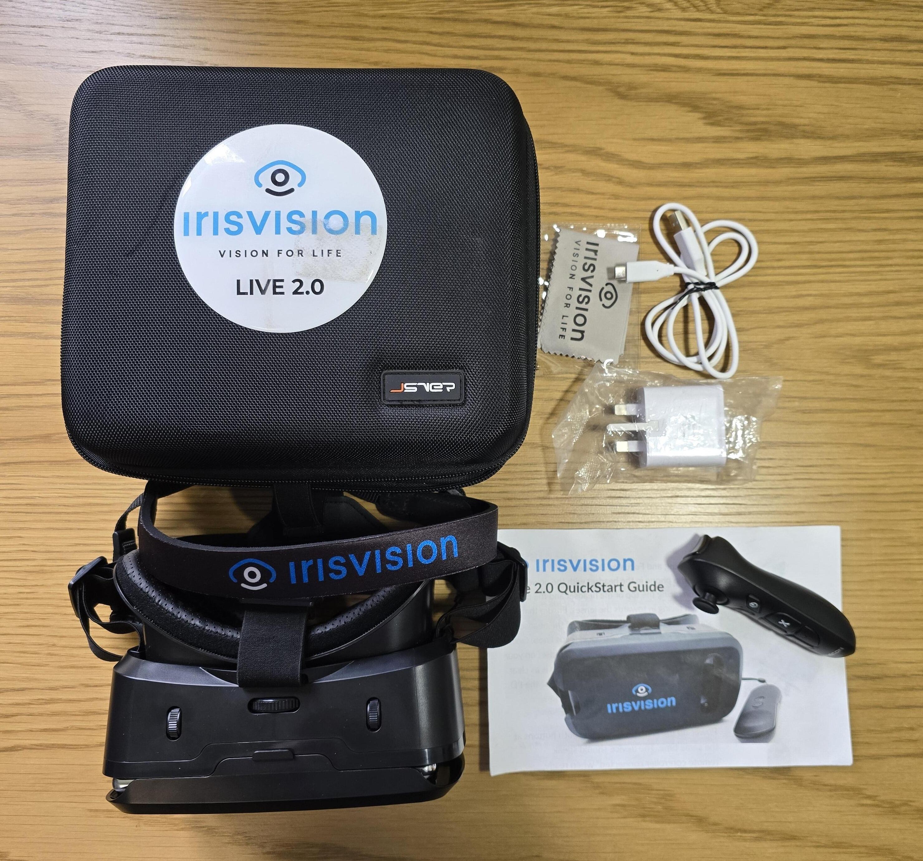 Ex Demo IrisVision Live 2.0 on a table wit its case and accessories placed next to it