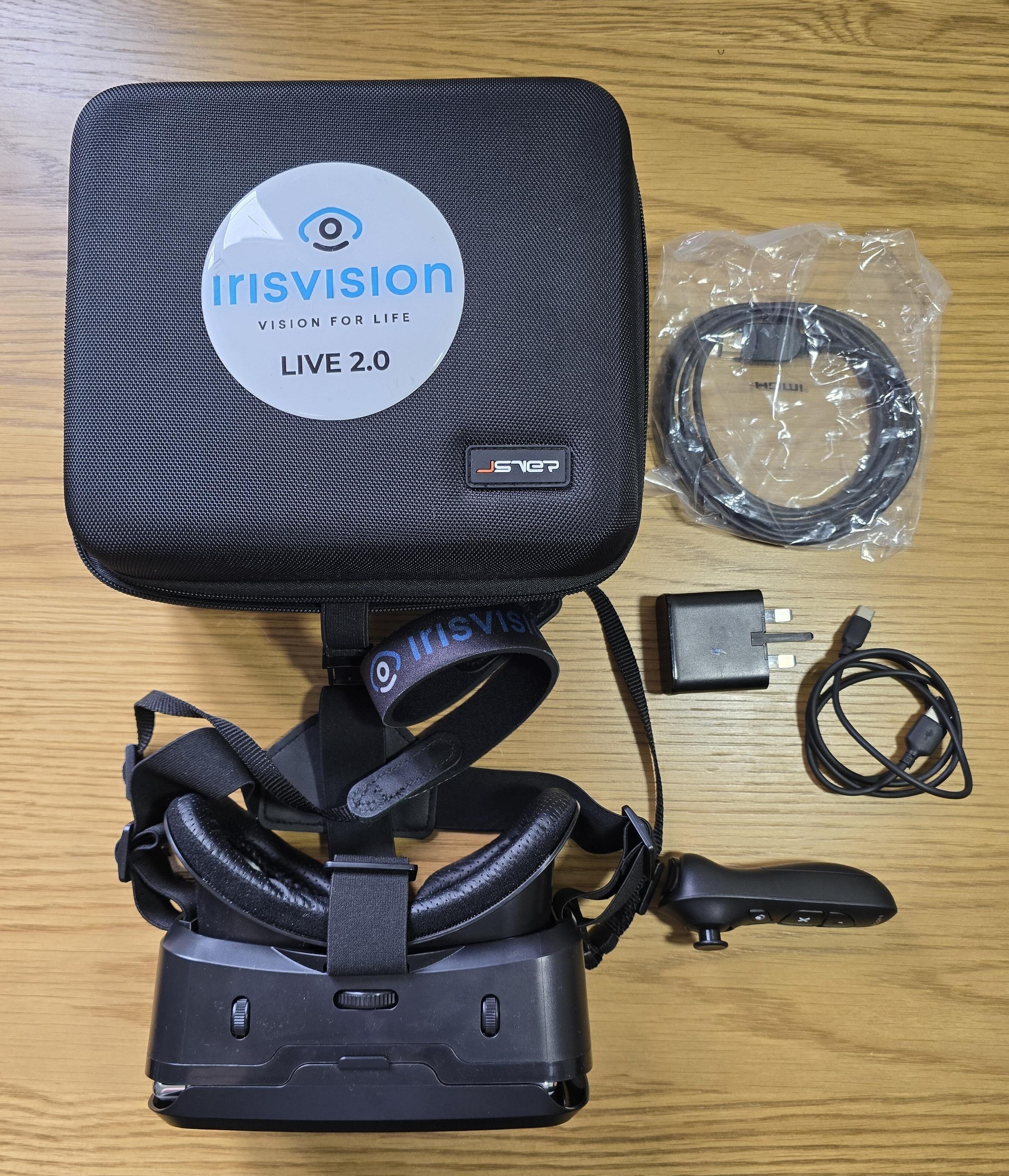 Ex Demo IrisVision Live 2.0 on a table wit its case and accessories placed next to it