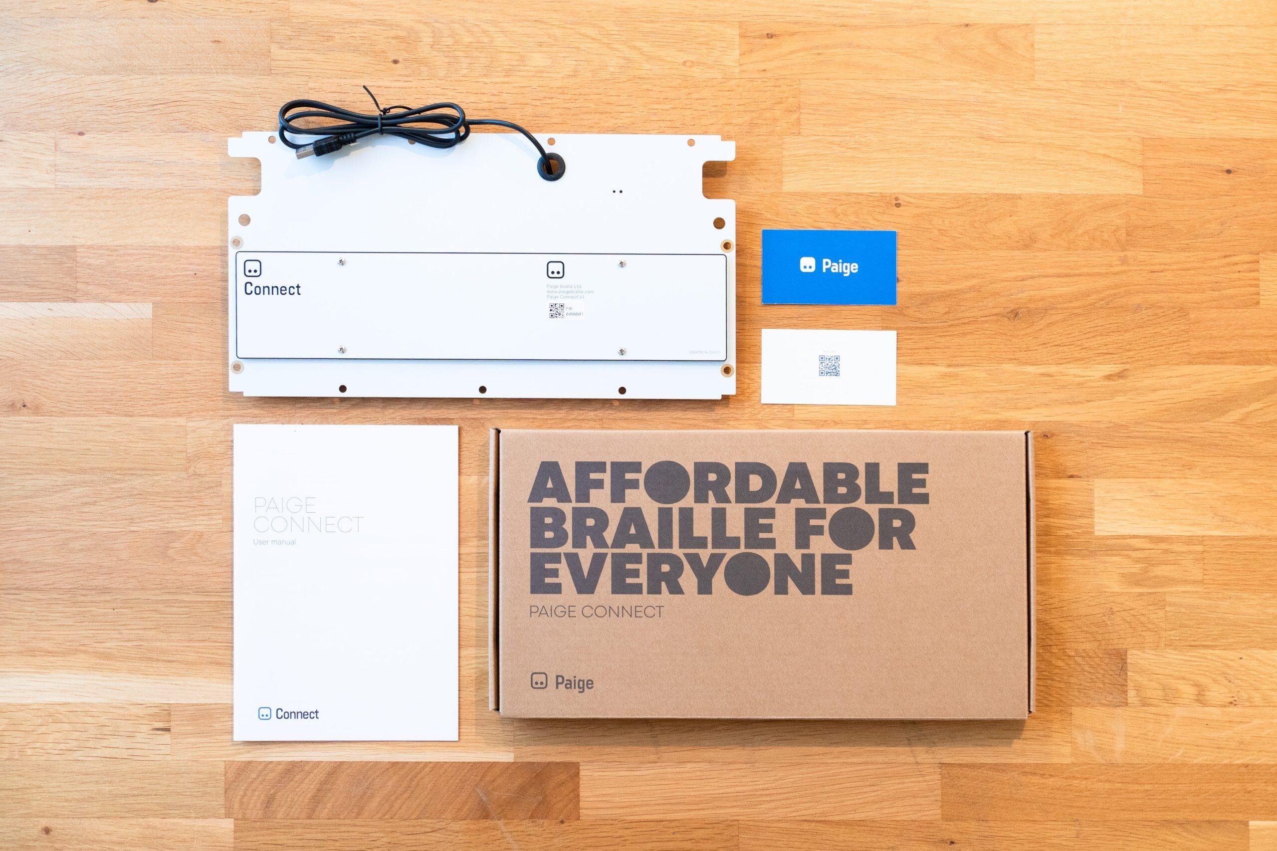the paige connect with its box and user manual